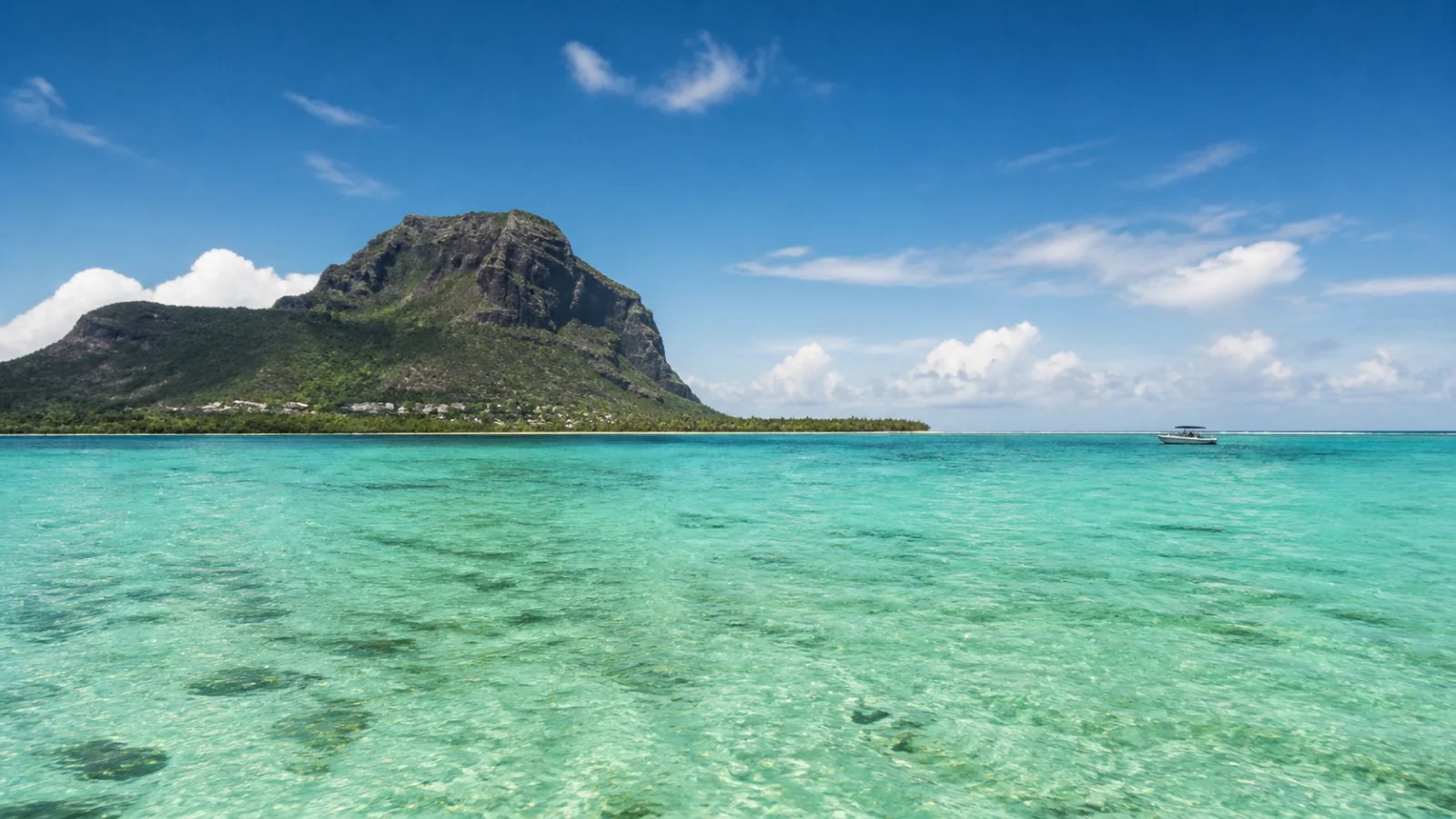 Turquoise lagoon and authorised boat activity in Mauritius