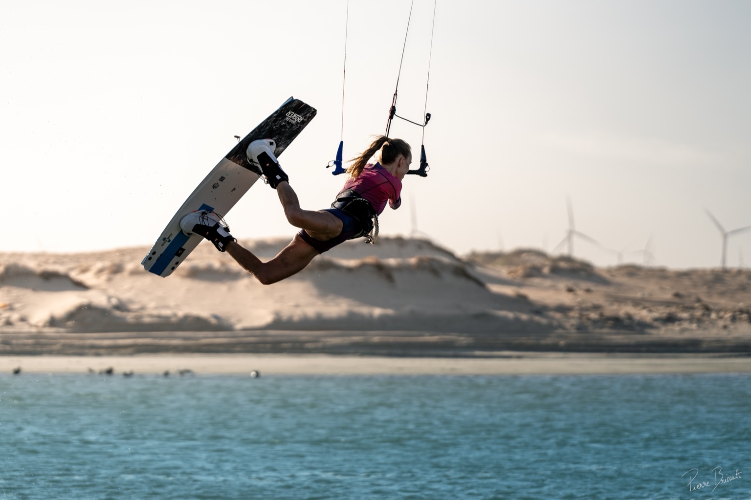 Kitesurfing instructor with students on the beach at Le Morne